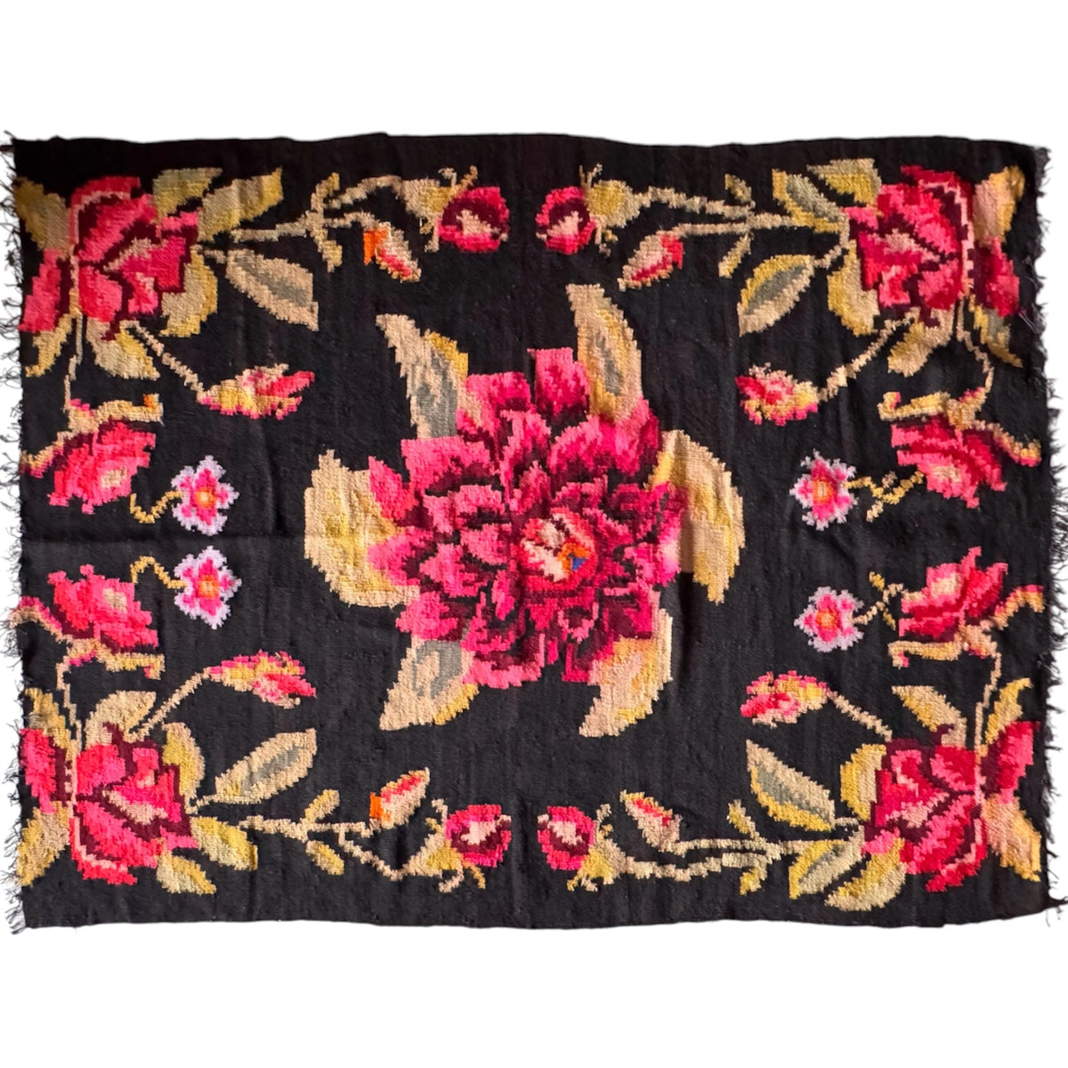 Traditional Romanian floral rug with black background and vibrant colours