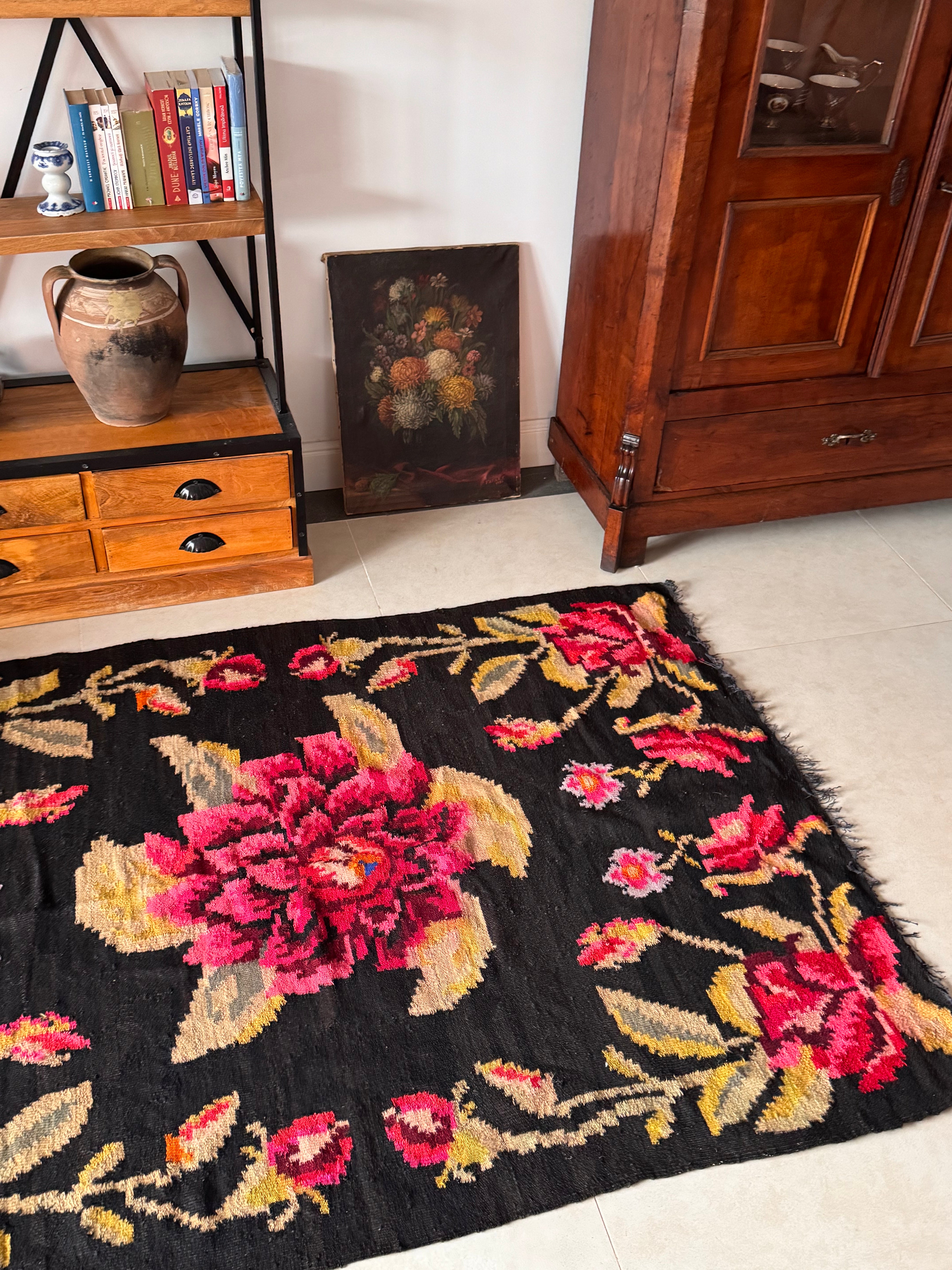 Close-up of traditional floral patterns on a Romanian folk rug