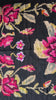 Traditional Romanian floral rug with black background and vibrant colours