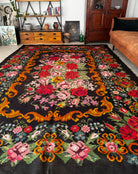 Vintage Bessarabian handwoven wool rug, floral design on black background – photo 6