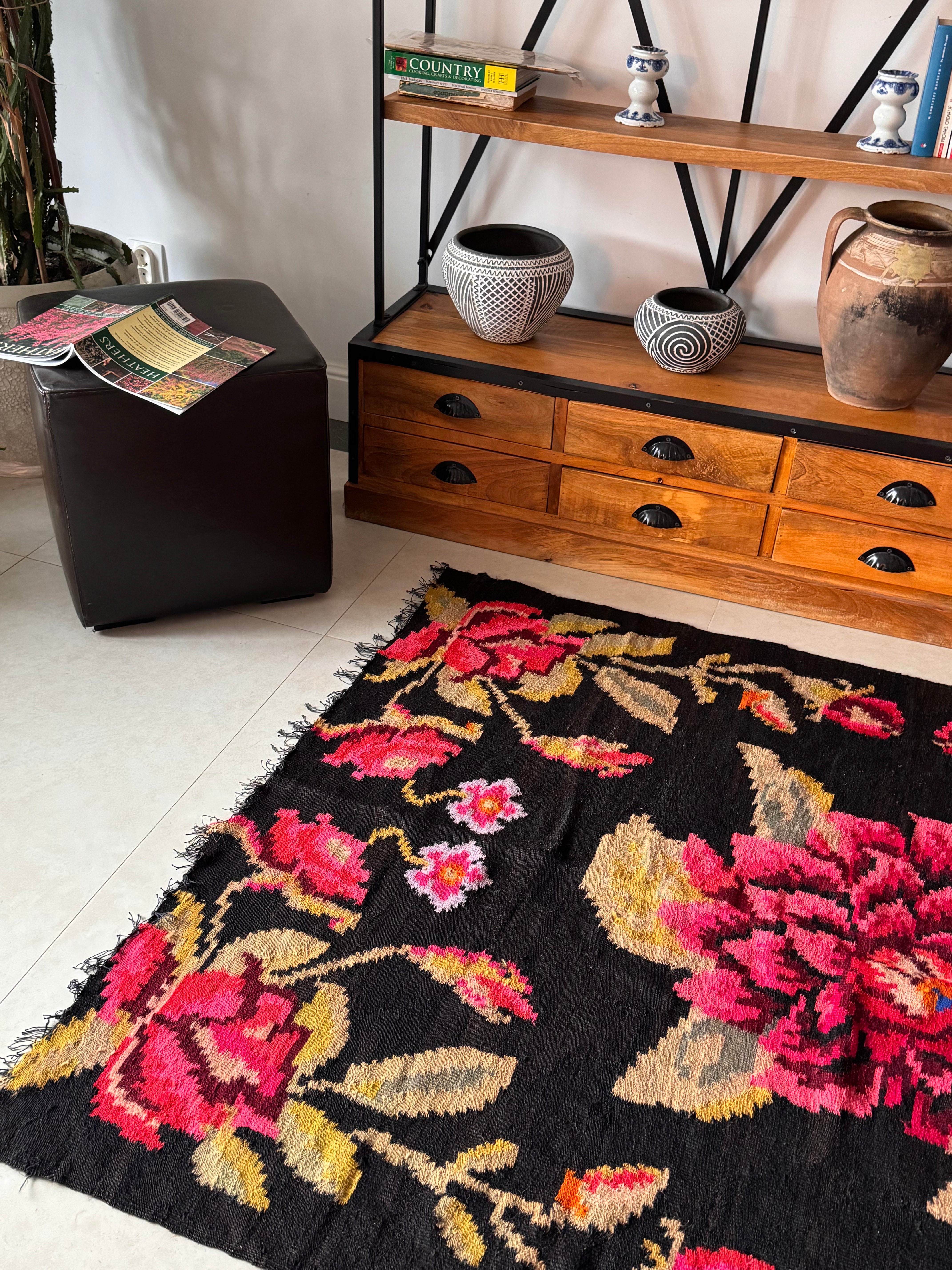 Handmade floral rug from Maramureș, Romania, featuring traditional folk motifs